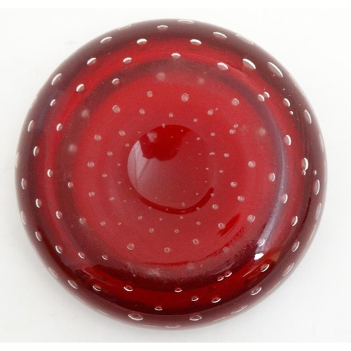 696 - Retro glass : A Whitefriars style red glass bowl with air bubble inclusions,. 6'' diameter