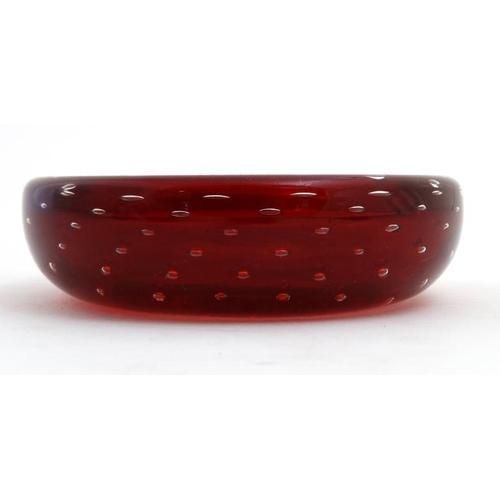 696 - Retro glass : A Whitefriars style red glass bowl with air bubble inclusions,. 6'' diameter