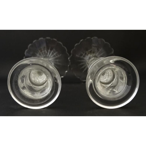 706 - A pair of cut glass candlesticks 8 1/2'' high