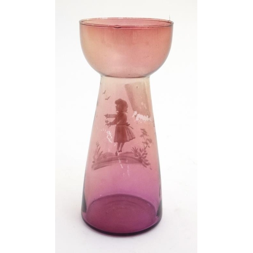 708 - A glass hyacinth vase with cranberry style finish and Mary Gregory style enamel decoration 7 1/4'' w... 