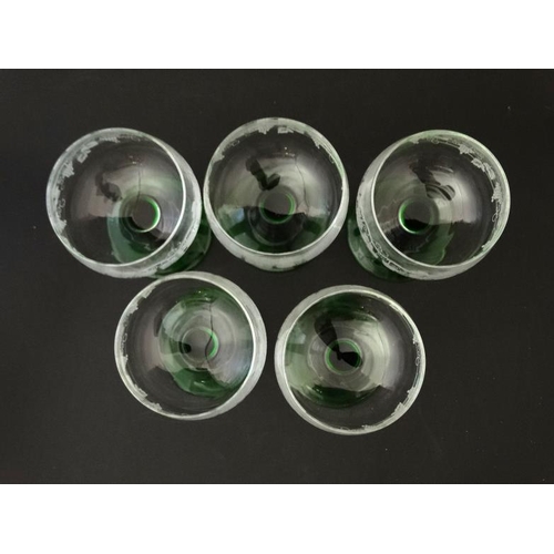 711 - 5 mid-late 20thC wine glasses with fruiting vine decoration to bowl and green stem and foot. Marked ... 