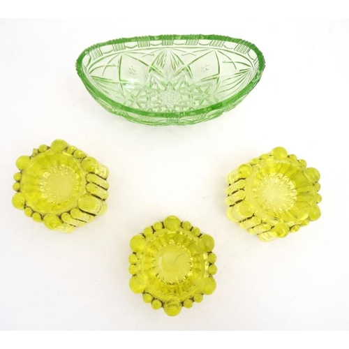 719 - Uranium glass : A set of 3 yellow glass table salts with lobed decoration 3 1/2'' wide x 2'' high  t... 