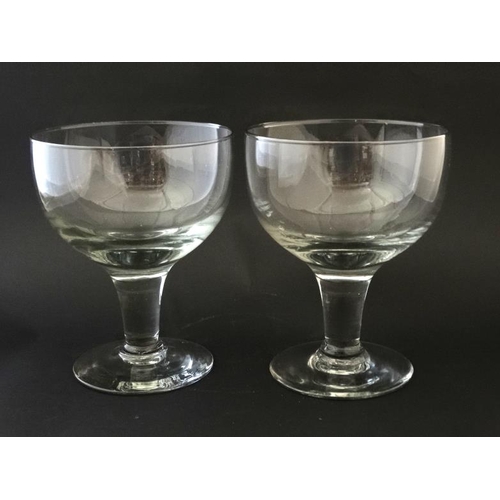 724 - A pair of large rummer style pedestal glasses  6 1/2'' high x 5'' diameter