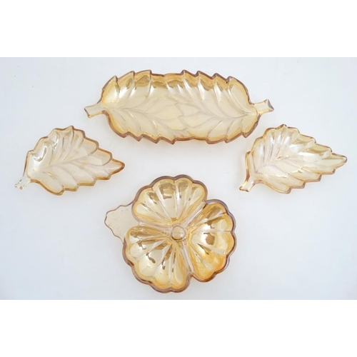 725 - Carnival Glass : 4 glass dishes of floral and foliate form with amber luster finish. The largest 10 ... 