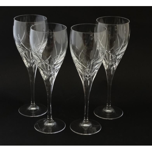 729 - A set of 4 large pedestal wine glasses with cut decoration 9 1/2'' high