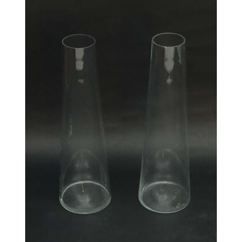 731 - Lilly vases : A pair of tapering cylindrical glass lilly vases. Approx 23 1/2'' high