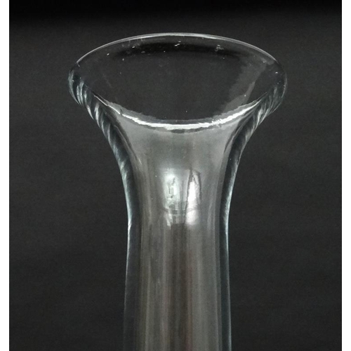 732 - A tall glass vase with flared rim approx 25'' high