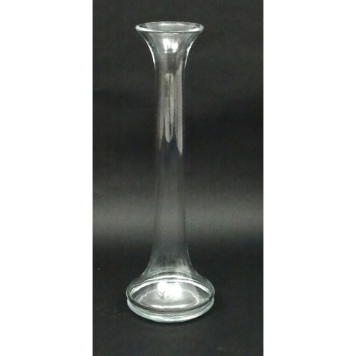 732 - A tall glass vase with flared rim approx 25'' high