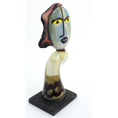 735 - Art Glass: An 20thC art glass sculpture of a stylised female head , Probably Murano . The whole 18 1... 