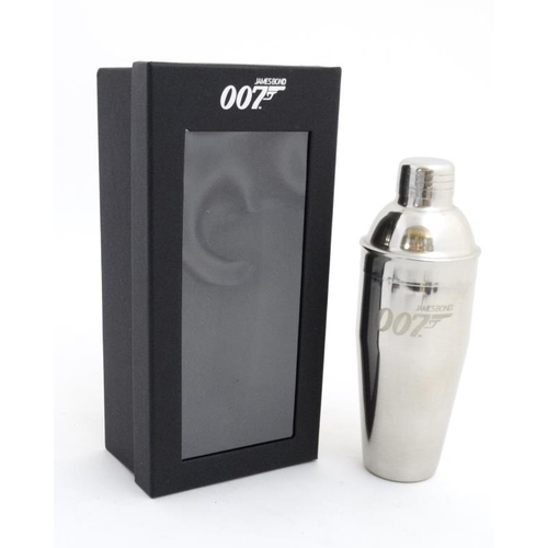 739 - A Novelty James Bond Stainless steel cocktail shaker in original box with 'Vesper Martini' recipe to... 