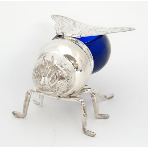 742 - A late 20thC / early 21stC novelty honey pot formed as a bee with blue glass body and silver plated ... 