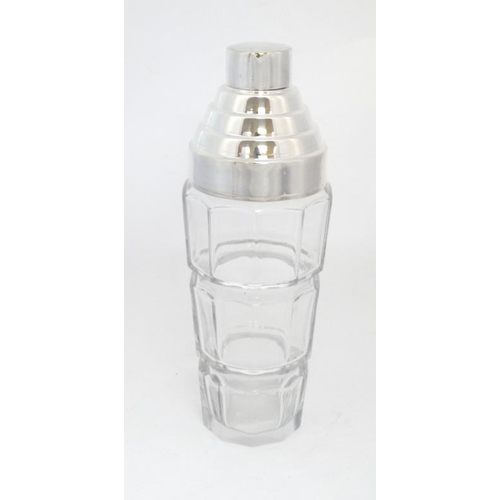 744 - A 21stC Art Deco style glass cocktail shaker with silver plated mounts . 10 1/4'' high.