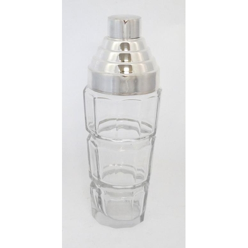 744 - A 21stC Art Deco style glass cocktail shaker with silver plated mounts . 10 1/4'' high.