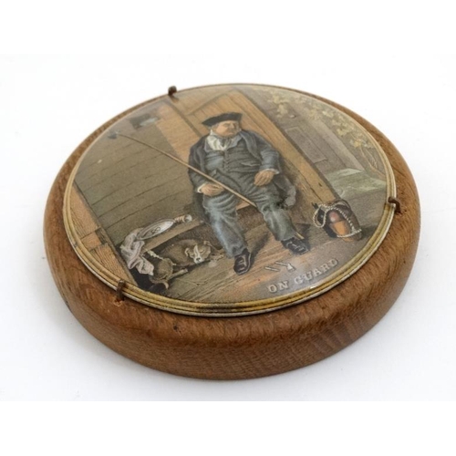 756 - A Staffordshire Pratt Ware '' On Guard '' coloured pot lid mounted on wooden base. 4 1/4'' diameter.