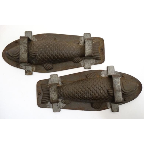 760 - Kitchenalia : An early / mid 20thC double Trout fish chocolate / mousse mould, one numbered 8710. Ea... 