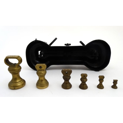 763 - A set of early/mid 20thC English made, Libra Scale Co black cast iron balance scales, having makers ... 