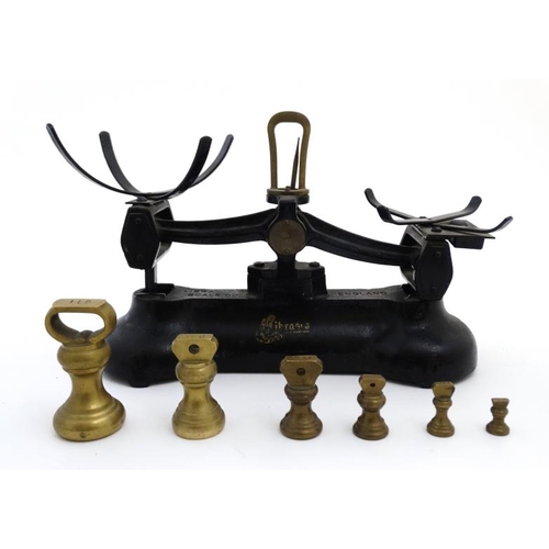 763 - A set of early/mid 20thC English made, Libra Scale Co black cast iron balance scales, having makers ... 