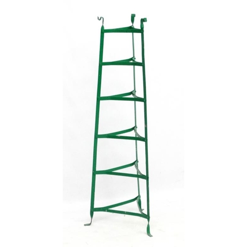 767 - An early/mid 20thC Green painted iron 6 tiered pot stand . 49'' high.