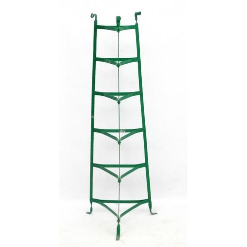 767 - An early/mid 20thC Green painted iron 6 tiered pot stand . 49'' high.