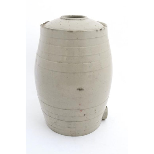 774 - A late 19thC / early 20thC ceramic cream glazed 4 gallon barrel. 17 1/2'' high