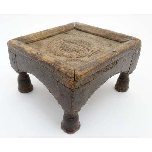 779 - Ethnographic Native Tribal :   A carved wooden footstool with chip like carved decoration,6 1/2'' hi... 