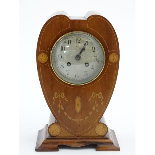 78 - Rowell Oxford : a signed Art Nouveau shaped case inlaid mahogany mantle clock, striking on a coiled ... 