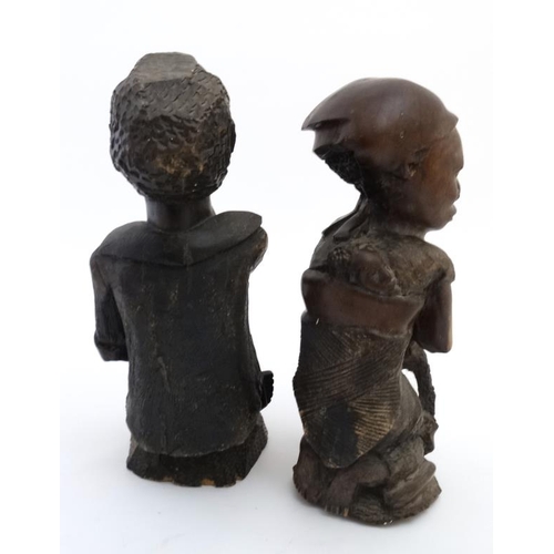 784 - Ethnographic Native Tribal :   A pair of carved hardwood African  figures , the male contemplating a... 