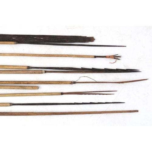 785 - Ethnographic Native Tribal :   A quantity of  arrows and a bow  ,some with harpoon like end for fish... 