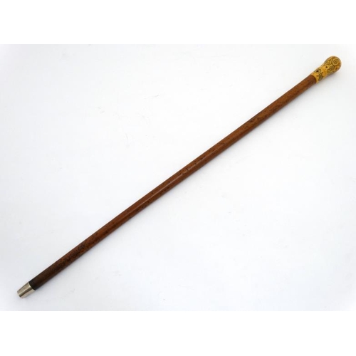 787 - An 18thC walking stick with ivory piquet work handle, malalaca shaft and later white metal ferrule 3... 