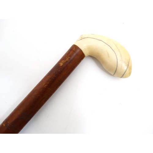 788 - Walking Stick : A 19 thC ivory palm swell handle on a malacca shaft ,34 1/2'' long