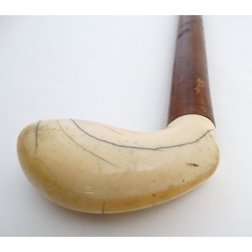 788 - Walking Stick : A 19 thC ivory palm swell handle on a malacca shaft ,34 1/2'' long