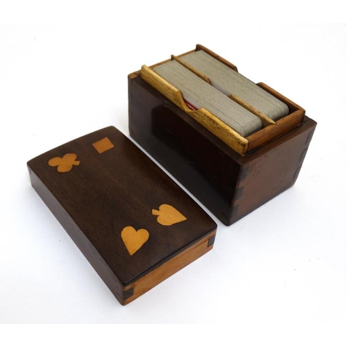 791 - A 19thC inlaid card box, the top with the 4 suits inlaid to lid opening to reveal 2 playing card pac... 