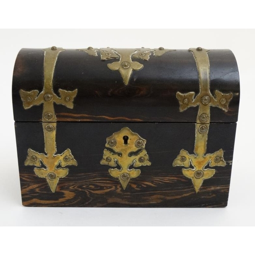 794 - A 19thC dome topped brass bound coromandle stationary box. 6 1/2'' high x 9'' wide x 4 1/4'' deep