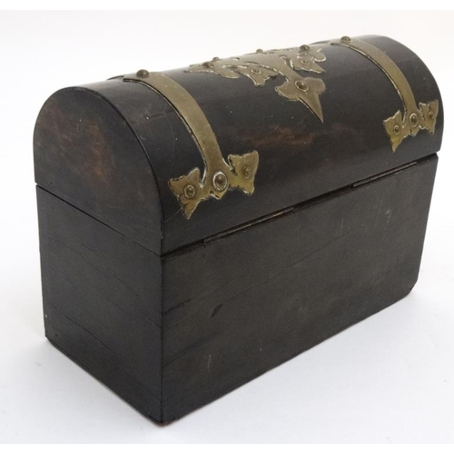 794 - A 19thC dome topped brass bound coromandle stationary box. 6 1/2'' high x 9'' wide x 4 1/4'' deep