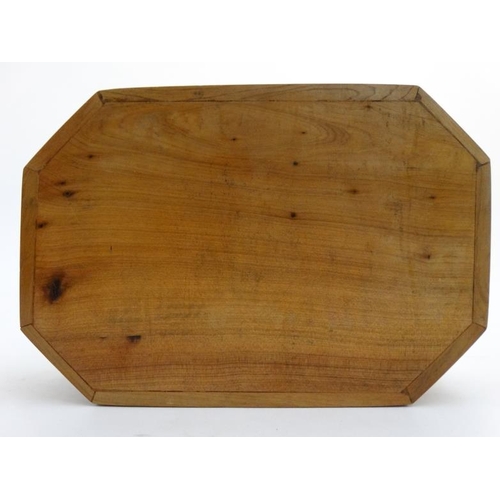 799 - A 20thC walnut box of octagonal form with burr wood decoration . 5 1/4'' x 8'' x 2 1/4''