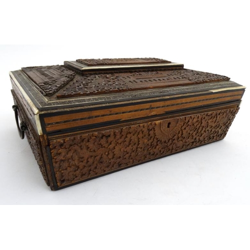 802 - Indian carved sandalwood and vizagapatam ladies workbox with lift out section and fitted section und... 