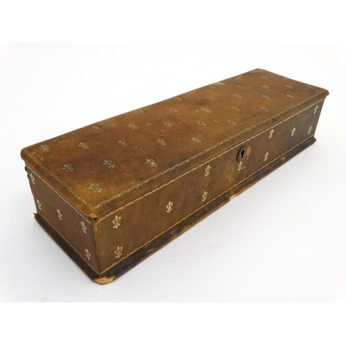 806 - A La Toilette Pont Des Marechaux : A French gold tooled leather glove box opening to reveal silk int... 