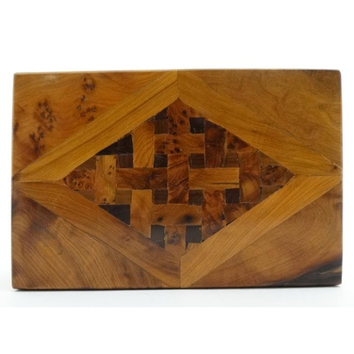 809 - A 20thC walnut cigar box inlaid with diamond pattern and marquetry to top 5'' deep x 7 3/4'' wide x ... 