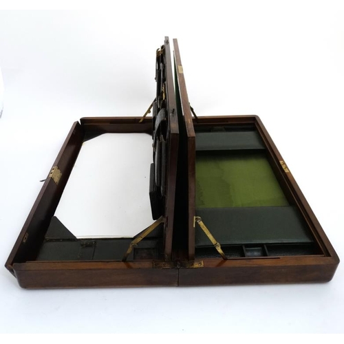 815 - A c.1910 unusual inlaid walnut  writing box with green leather fitments for stamps, pocket watch, en... 