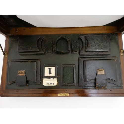 815 - A c.1910 unusual inlaid walnut  writing box with green leather fitments for stamps, pocket watch, en... 