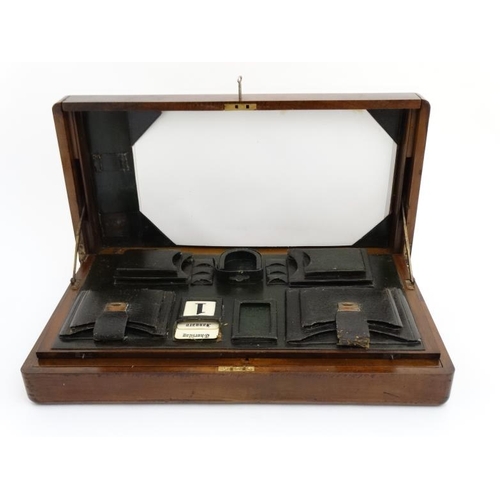 815 - A c.1910 unusual inlaid walnut  writing box with green leather fitments for stamps, pocket watch, en... 