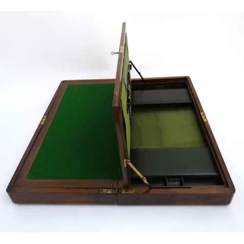 815 - A c.1910 unusual inlaid walnut  writing box with green leather fitments for stamps, pocket watch, en... 