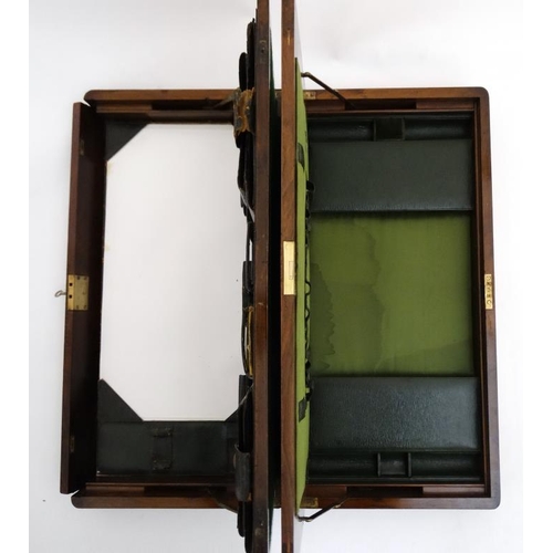 815 - A c.1910 unusual inlaid walnut  writing box with green leather fitments for stamps, pocket watch, en... 