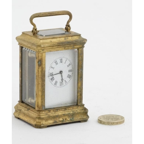 82 - Miniature Carriage Clock  : an early - mid 20thC 5 bevelled glass miniature brass cased ,  key wind ... 