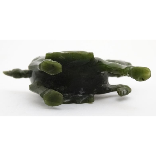 829 - A Chinese spinach green carving of a horse 3 1/8'' high x 4'' long