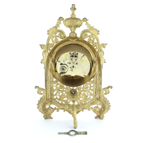 83 - Strutt / Easel Clock  : a key wind, cylinder time piece movement with platform escapement  within a ... 