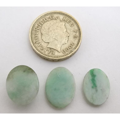 830 - 3 Oriental jade cabochon, 2 in the form of lily pads. Largest 5/8'' long