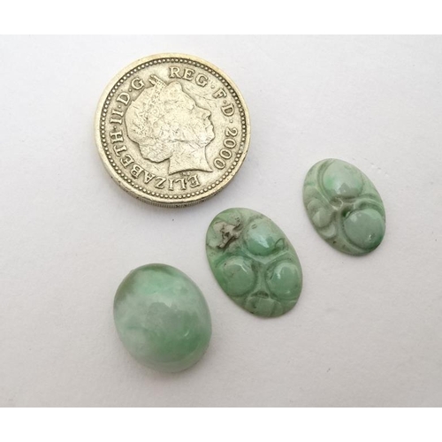 830 - 3 Oriental jade cabochon, 2 in the form of lily pads. Largest 5/8'' long