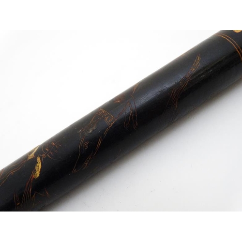 837 - A 19thC Indian cylindrical lacquered ruler with images of peacock, dog, antelope etc. 14'' long