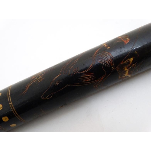 837 - A 19thC Indian cylindrical lacquered ruler with images of peacock, dog, antelope etc. 14'' long